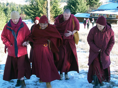 Venerable Chogkyi walking with the sangha.