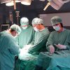 Medical professionals performing surgery.