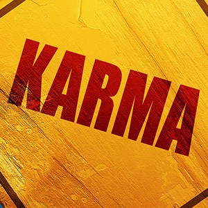 Graphic yellow and red image of the word karma.