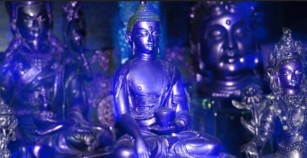 Blue statue of Medicine Buddha.