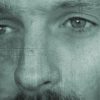 Closeup of face of man contemplating.