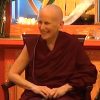 Venerable smiling while teaching.
