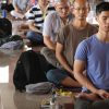 Students sitting in meditative posture.