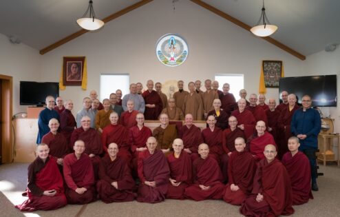 Group of monastics posing for a photo.