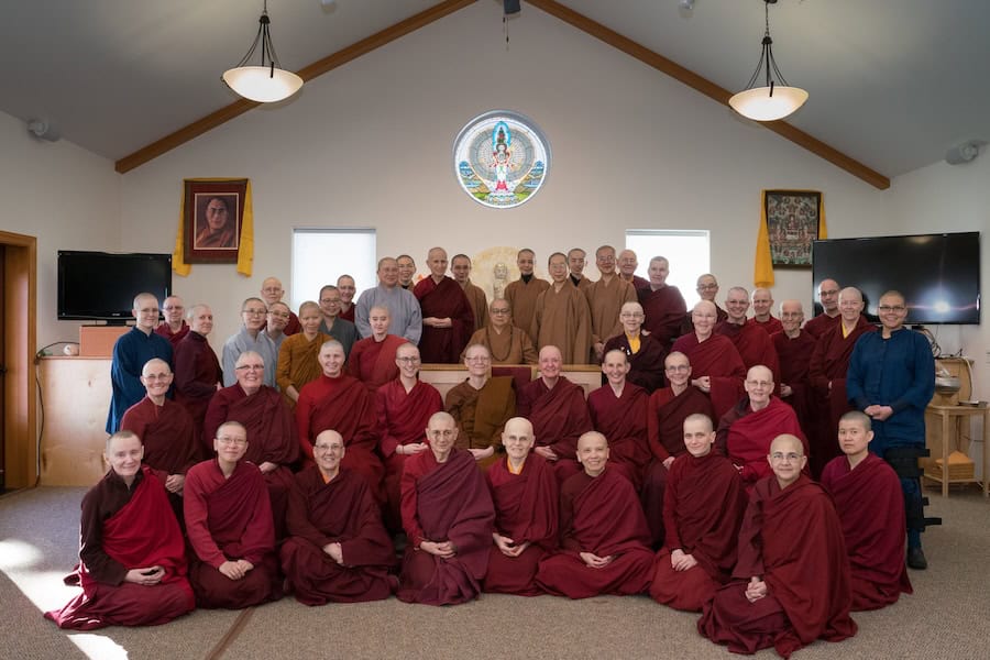 Group of monastics posing for a photo.