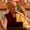 Venerable teaching and smiling.