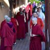 Group of monastics and laypeople doing walking meditation.