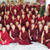 A large group of monastics posing for a photo.