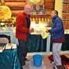 Ken Mondale at the Abbey setting up an altar with a fellow practitioner.