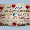 Plaque that says, "I vow to plant a garden on earth of loving kindness for all beings."