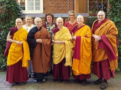 Venerable Chodron standing with monastics and lay people at Shide Nunnery.