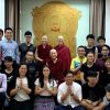 Group of Buddhist youth standing in group photo with Venerable Chodron, Venerable Chonyi, and Venerable Damcho.