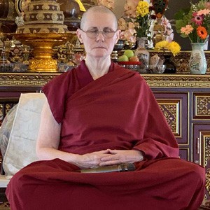Venerable Chonyi sitting in meditation posture.