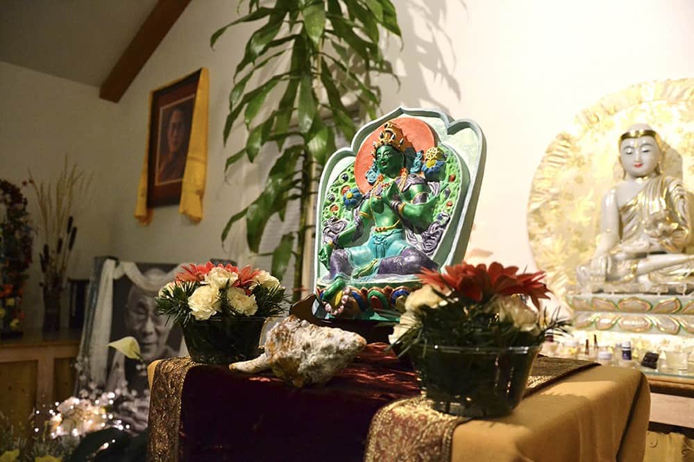 Green Tara tsa tsa on the Chenrezig Hall altar with offerings.