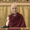 Venerable smiling while teaching.
