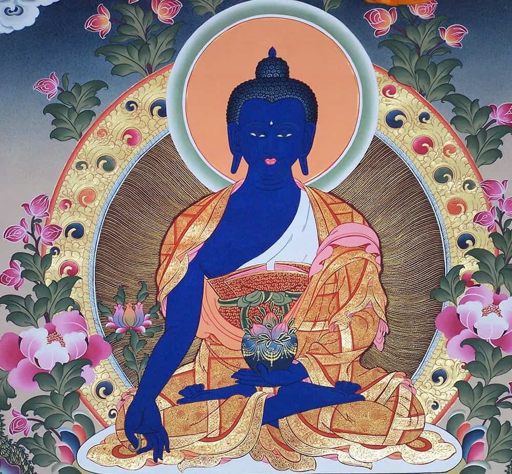 Blue medicine Buddha with right hand outstretched on his knee and left hand holding an alms bowl with nectar.
