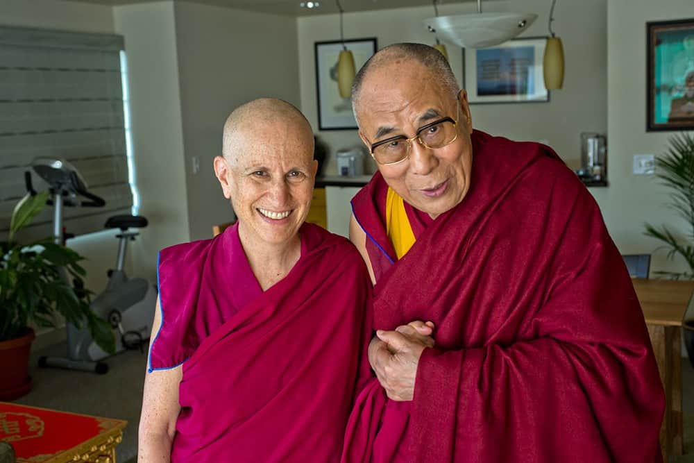 Venerable Chodron next to His Holiness the Dalai Lama.