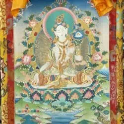 Thangka of White Tara with right hand outstretched and left hand holding a lotus.