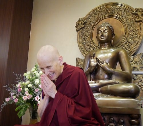 Venerable Chodron bows to the audience at Buddhist Fellowship.