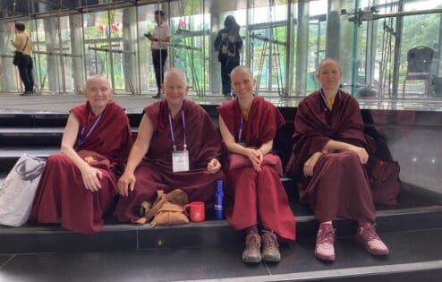 Four buddhist nuns from the Tibetan tradition attend the Sakyadhita Conference.