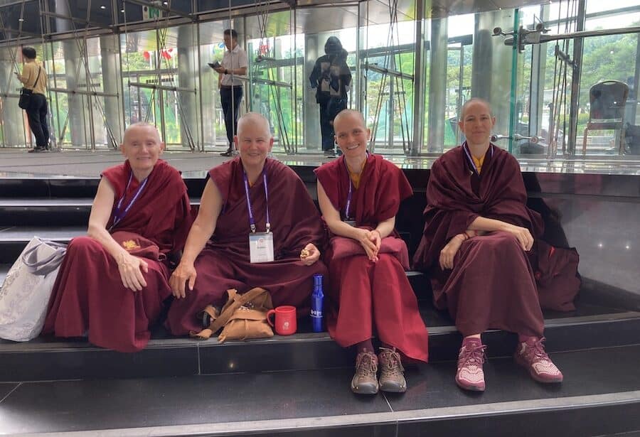 Four buddhist nuns from the Tibetan tradition attend the Sakyadhita Conference.