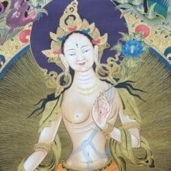 White Tara close up on upper body.