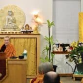 Venerable Sangye Khadro teaching a group at Sravasti Abbey with a Vajrasattva Thangka